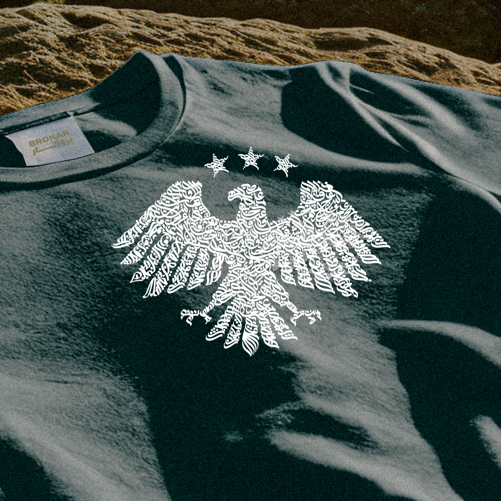 Syrian Heritage Tee – New National Logo Edition تيشيرت الهوية السورية – إصدار الشعار الوطني الجديد